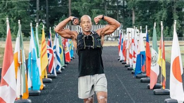 David Goggins hugging a marathon runner