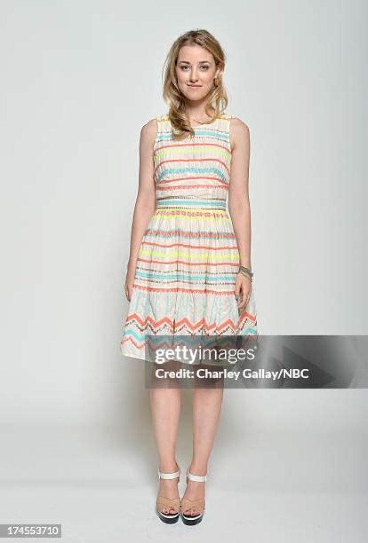 Ella Rae Peck posing for a photoshoot by wearing a mixed color cloth.