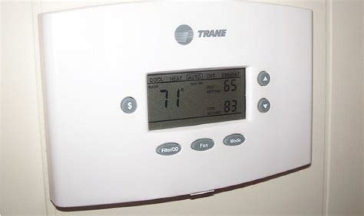 How do I lock my Trane thermostat?