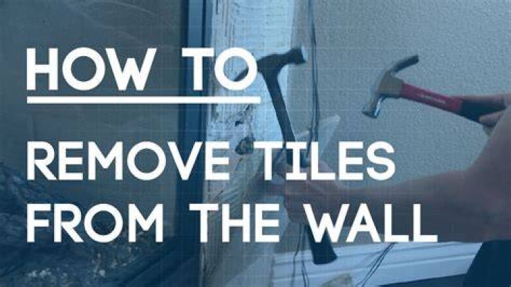 How do you remove mirror tiles from a wall?