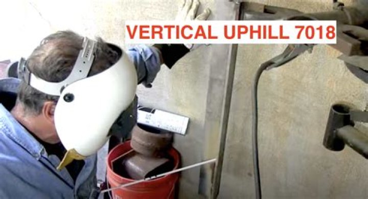 How do you stick weld vertical 7018?