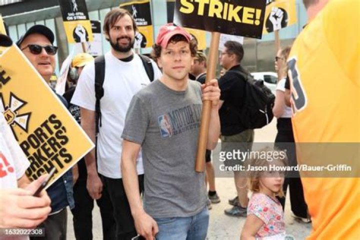 Jesse Eisenberg walks a picket line in support of the SAG-AFTRA and WGA strike outside HBO/Amazon Corporate Headquarters in Hudson Yards on August ...