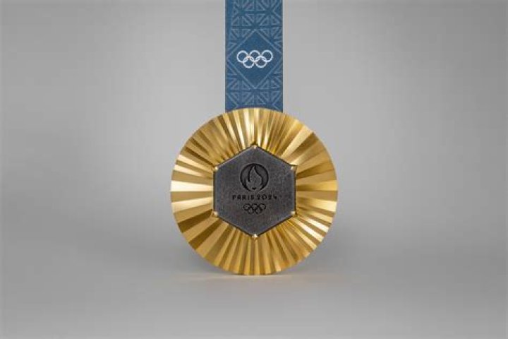 with his Olympic gold medal at 2000 Summer Olympics. (Source: Twitter)